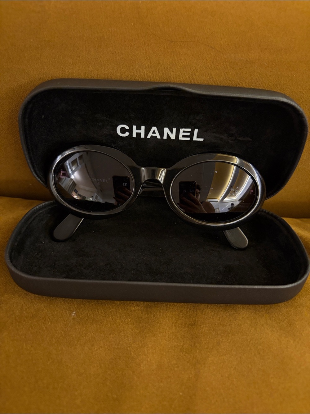 CHANEL Black Round Sunglasses with Dark Lenses